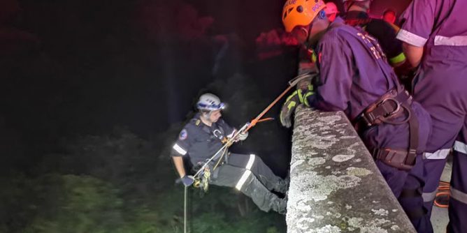 Rescuers had to abseil 30 metres down into a valley to rescue a woman who fell off a bridge outside Durban.